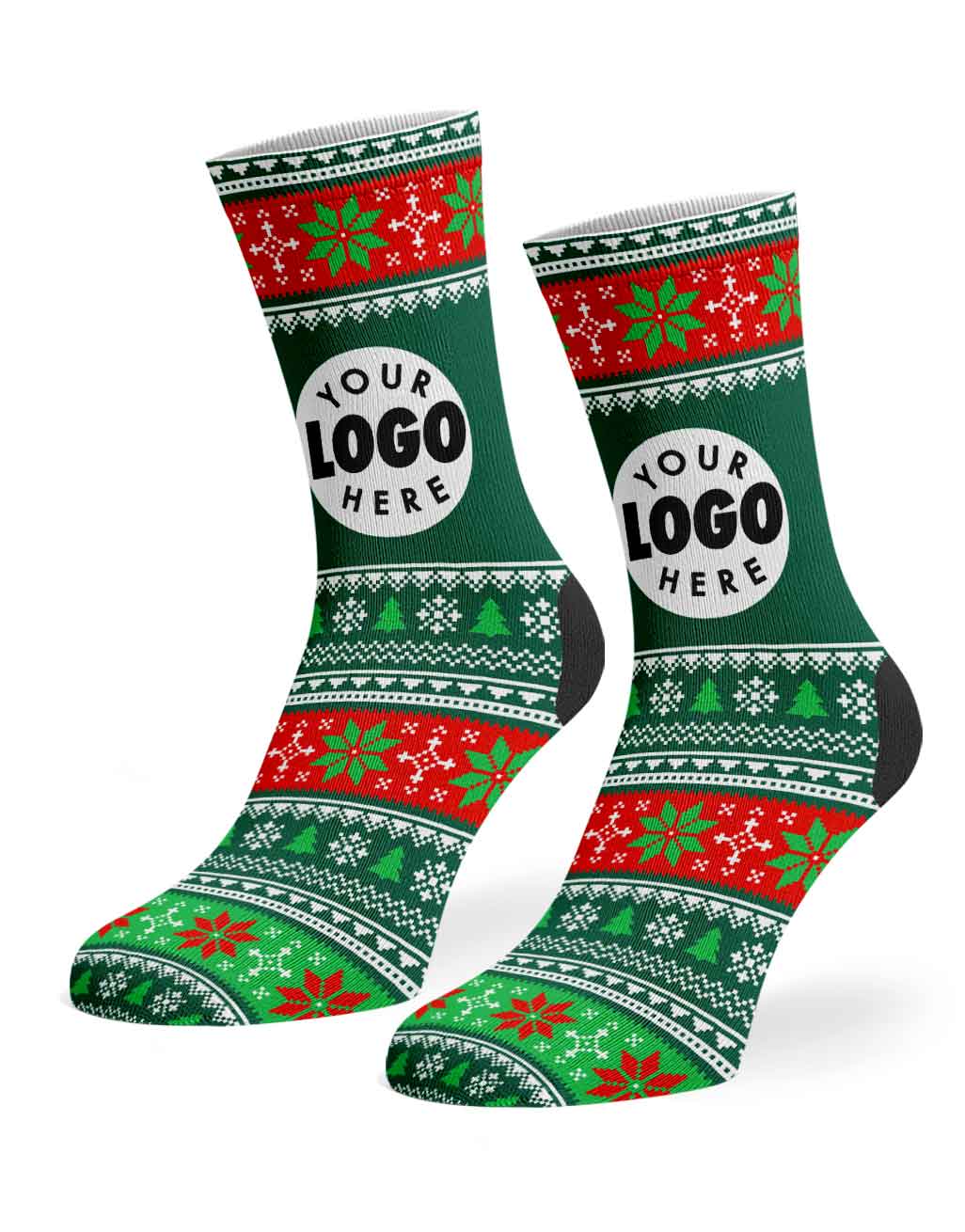 A pair of festive crew socks with a green, red, and white Christmas sweater pattern, featuring a customizable white circular logo placeholder on the side.