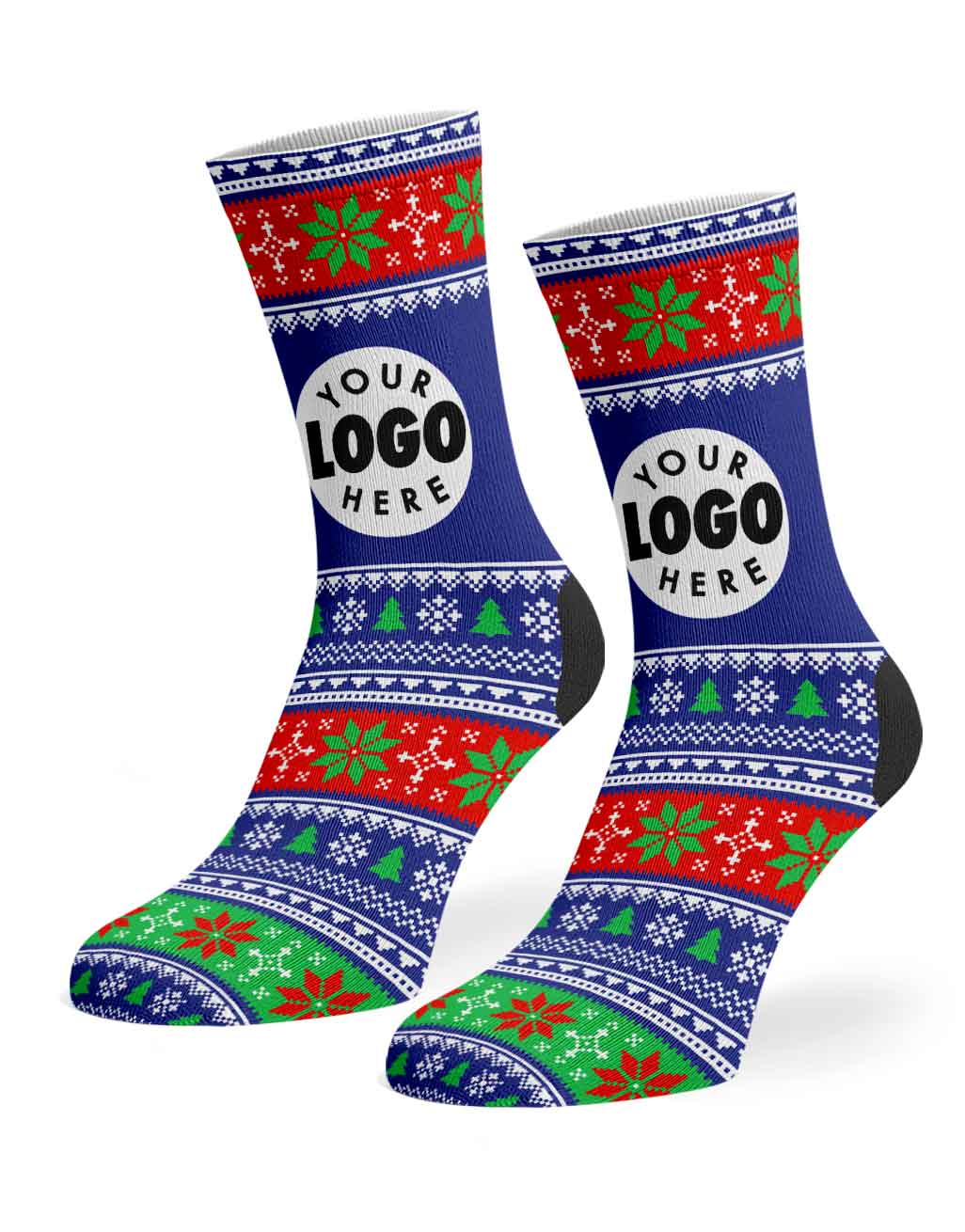 A pair of crew socks with a festive Christmas sweater pattern in blue, red, green, and white, featuring a customizable white circular logo placeholder on the side.