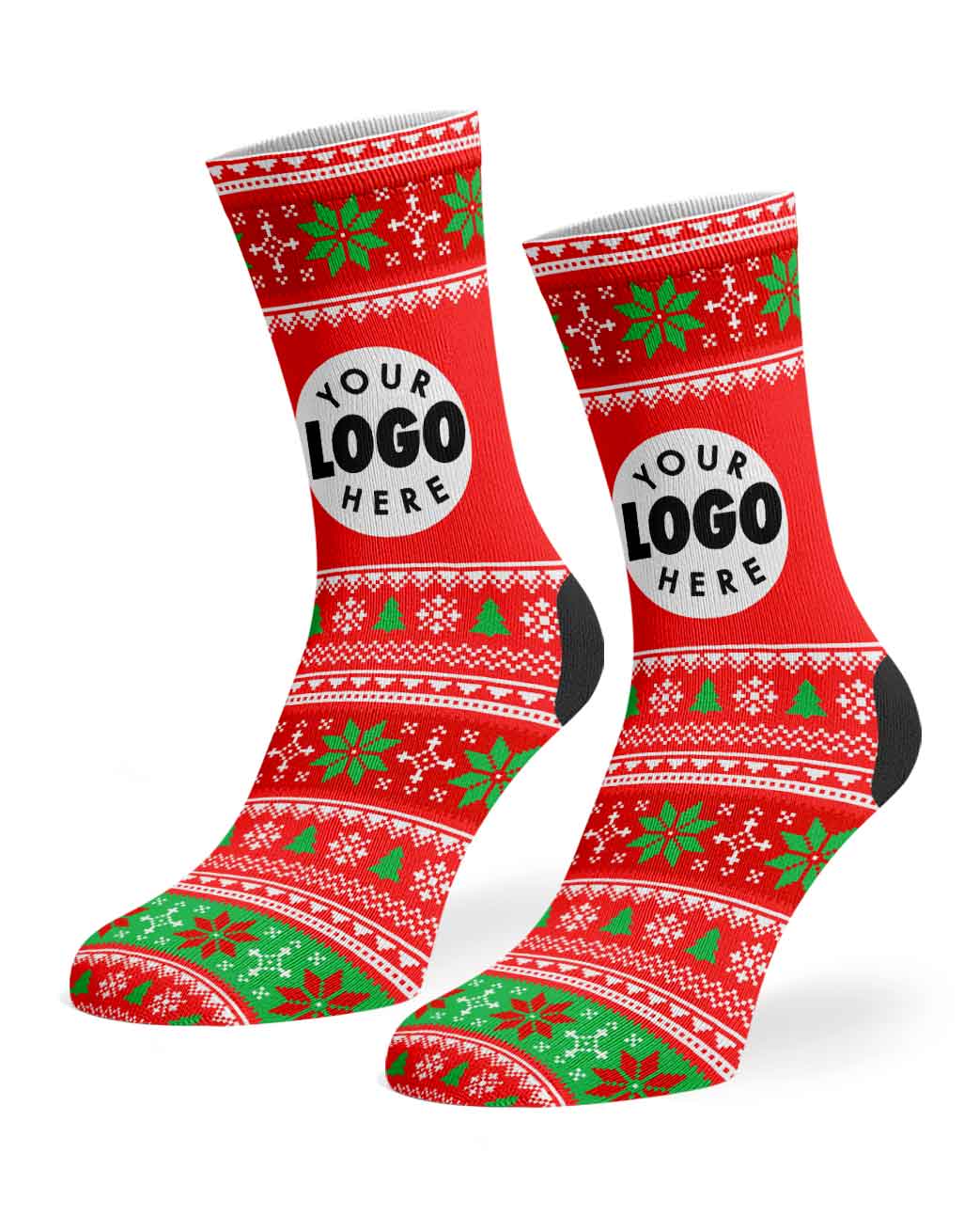 A pair of festive Christmas crew socks with a red, green, and white holiday pattern, featuring customizable white circular patches with the text 'YOUR LOGO HERE'.