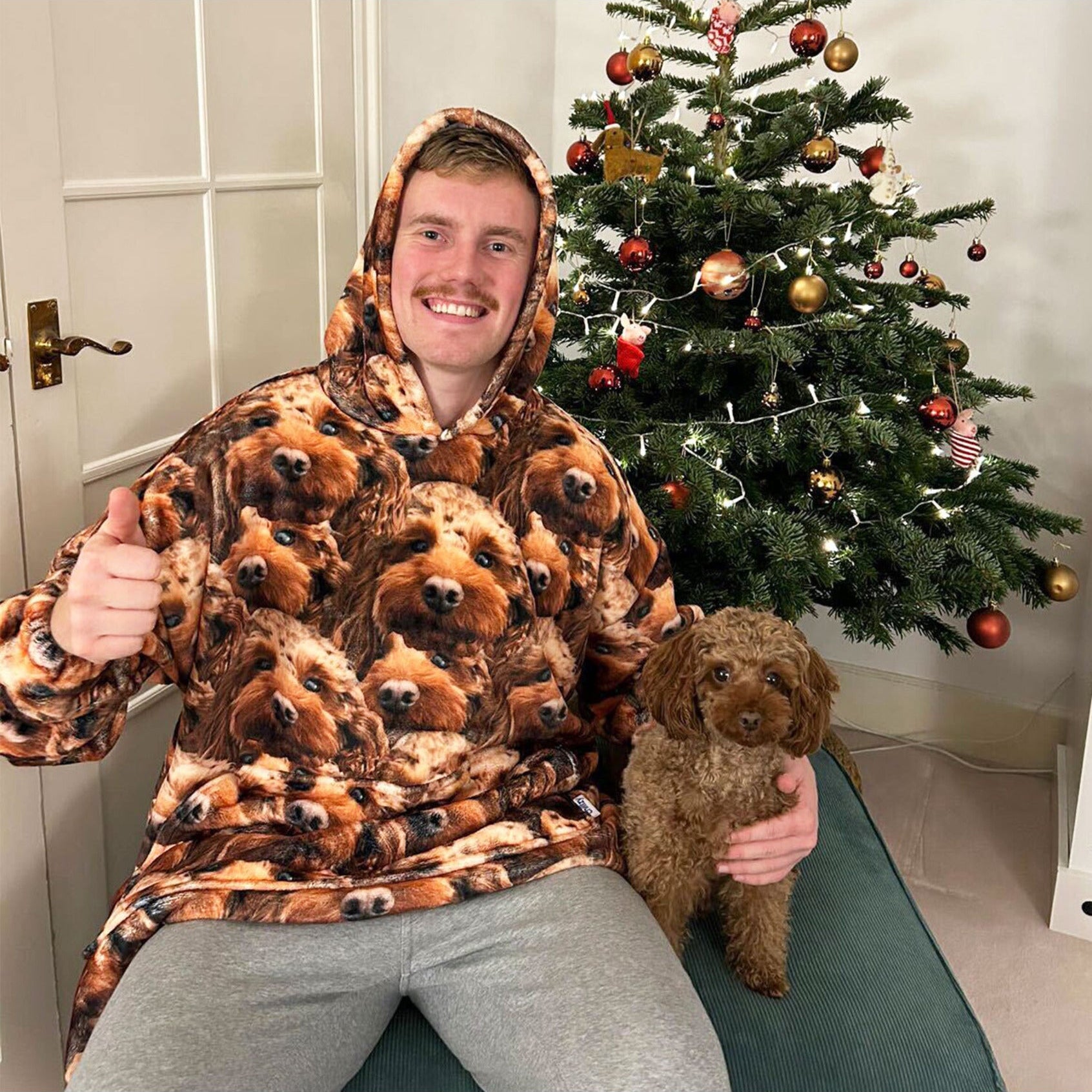 customer wearing their face mash dog photo hoodie blanket